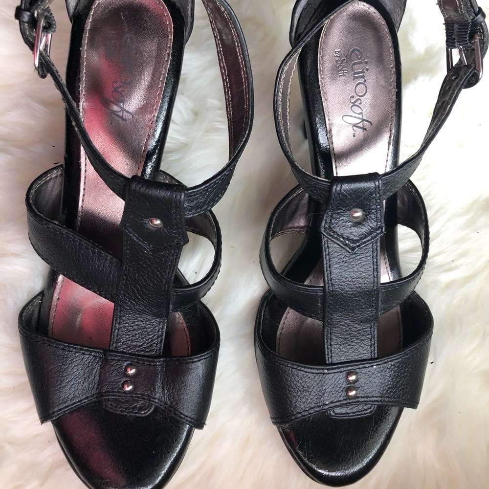 Black leather sandals with heel, ankle strap. Good quality. Great shape.